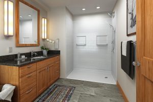 A remodeled bathroom with a wheelchair-accessible walk-in shower.